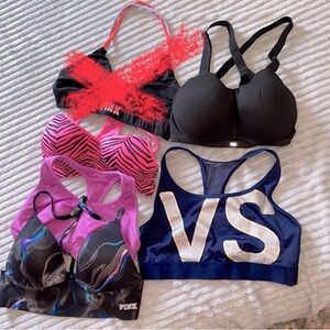 Pick from a group of six sports bras, all Victoria’s Secret/pink except for one.